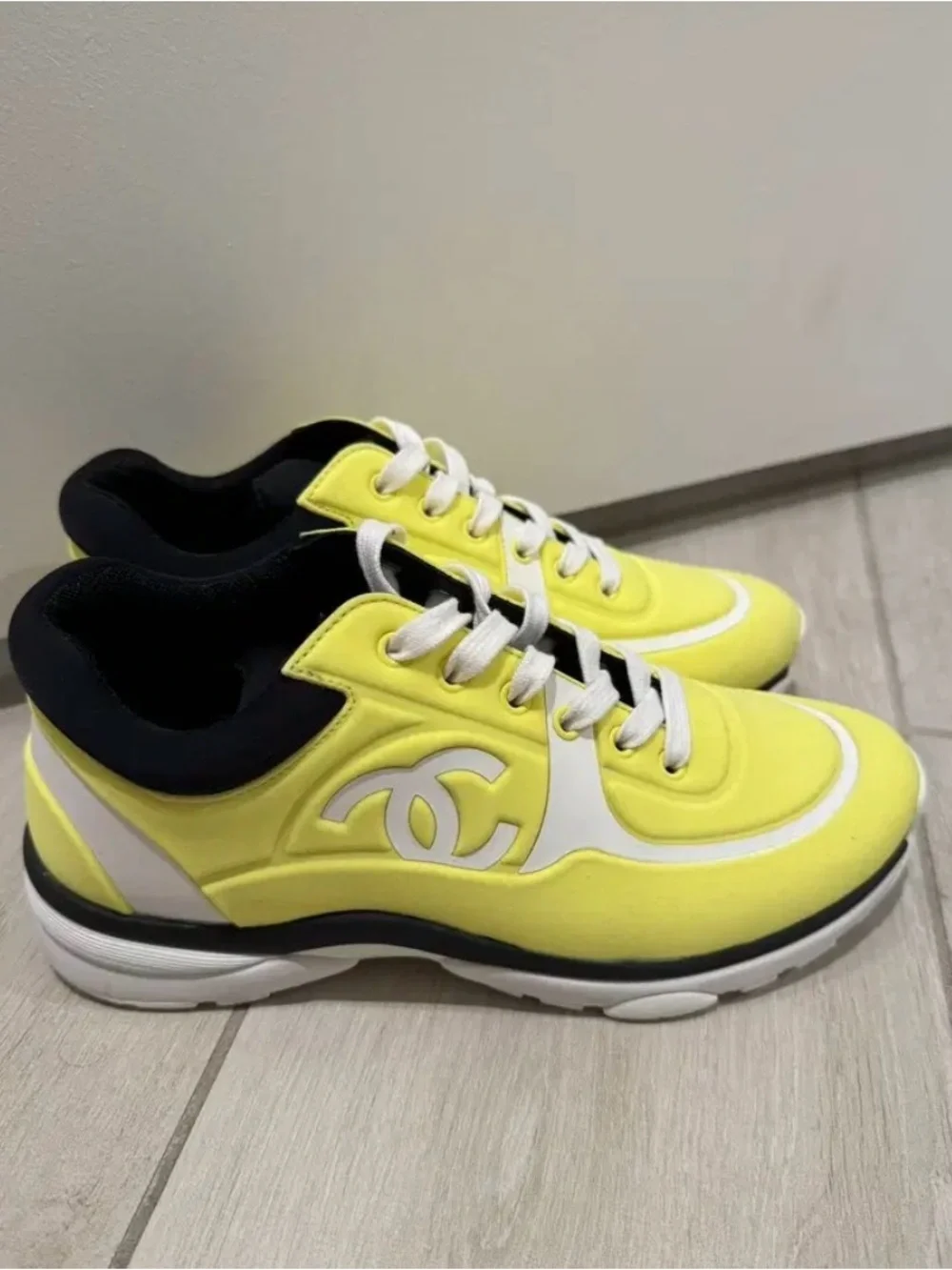 CHANEL Women’s Neon Yellow and White Logo Sneakers